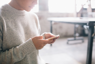 Web pages being viewed on a mobile phone.